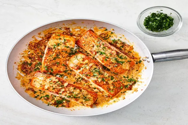 Salmon with Sun Dried Tomato Cream Sauce